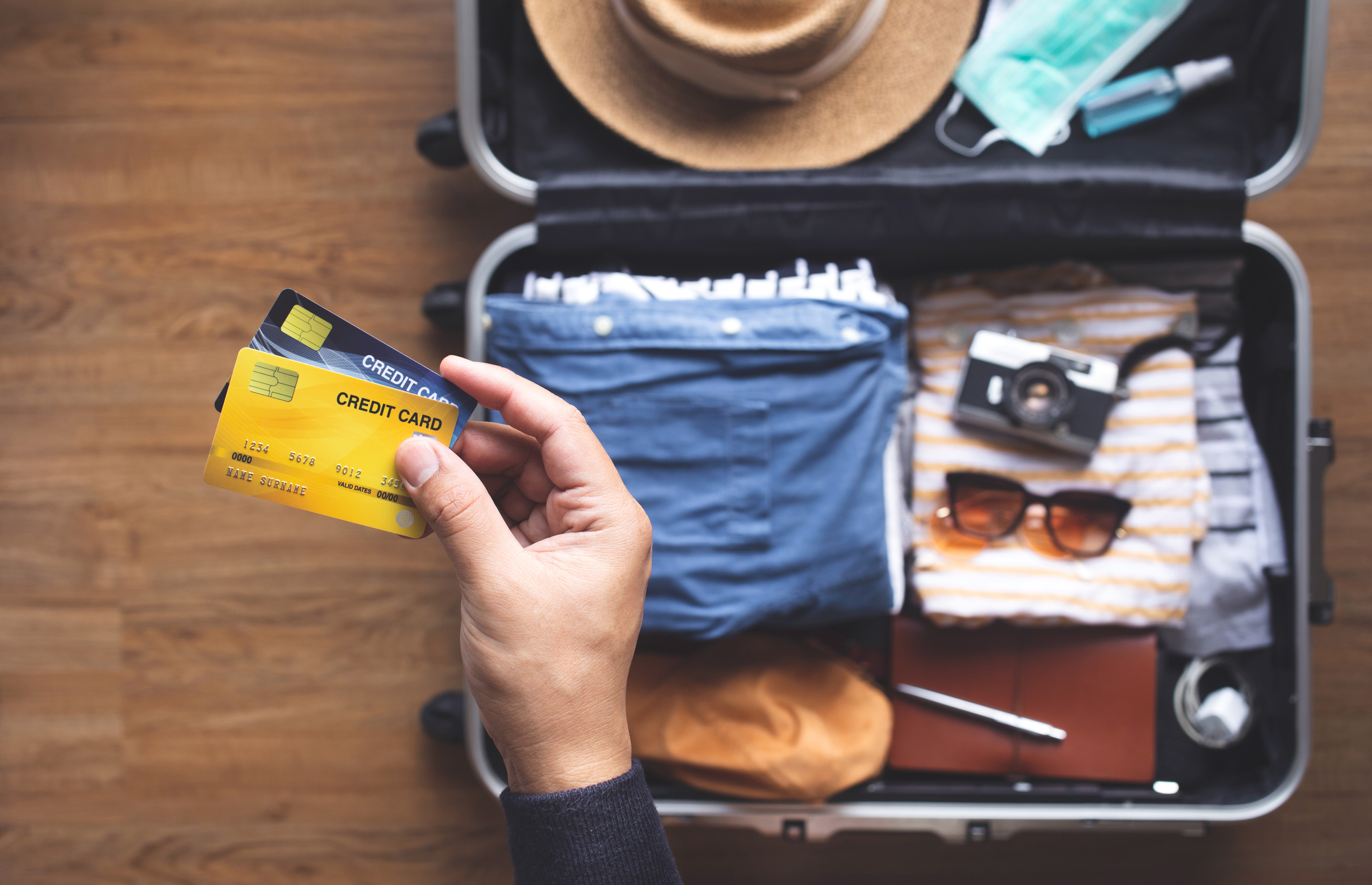 Young person using credit cards for payment on vacation or holiday trip.convenient  lifestyle with technology.
